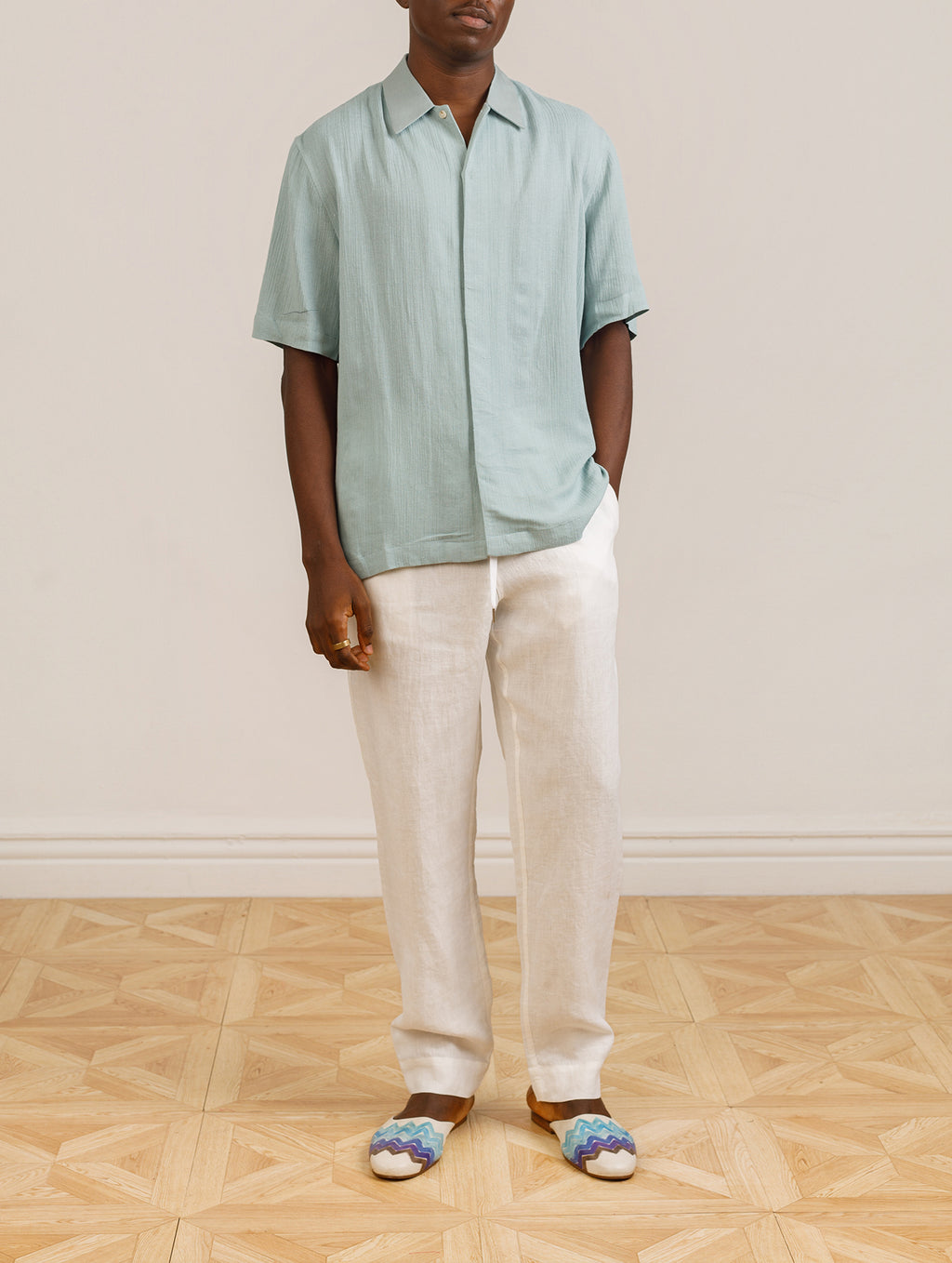 Sana Tapered Fit Trousers In Cream